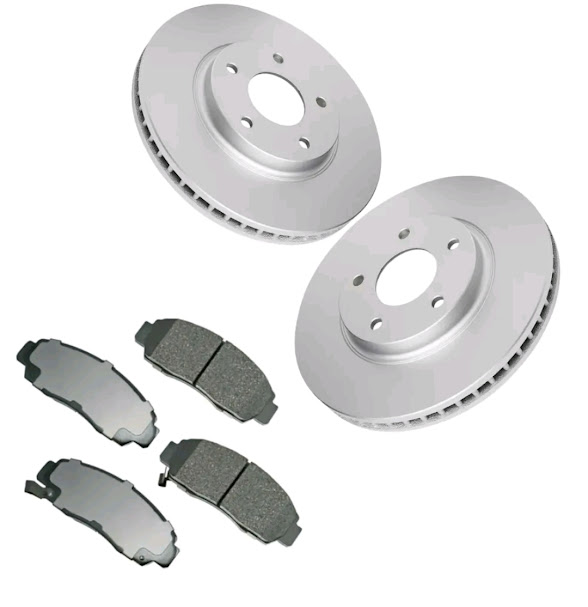 The Front brake pads of the Nissan Elgrand E51 are rectangular, typically made from metal and friction compounds. 4 pads are shown here (2 pairs). The pair of break discs are Circular metal components with a large central hole and smaller holes around it.